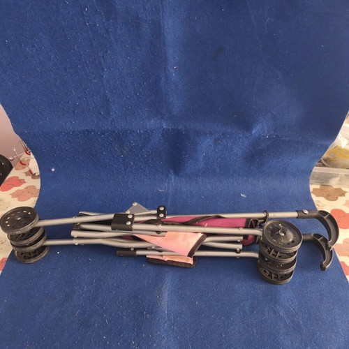 Toy stroller like new, lightweight and foldable