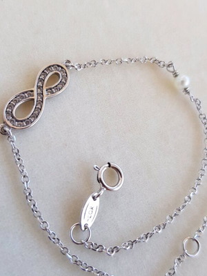 White gold 9K AL'ORO bracelet with infinity design used