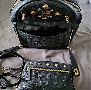 Mcm Monogrammed backpack with studs, and a detachable clutch cross body bag With her cloth bag