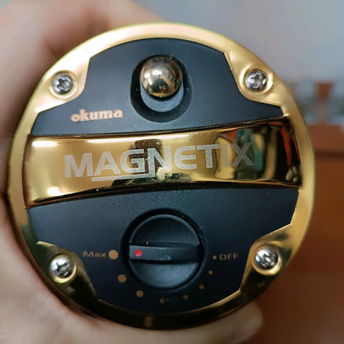 Okuma Magnetix fishing reel like new