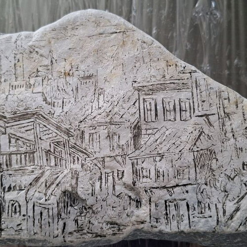 Artwork hand-engraved on stone like new