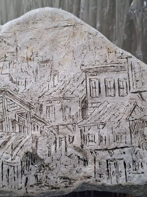 Artwork hand-engraved on stone like new