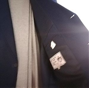 Κοστούμι νούμερο 48 του Μπαλαμπανου Πειραιάς. Σακκακι μπλε ,  παντελόνι γκρι ανοικτό.Σαν καινούργιο.