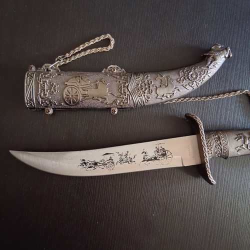 Decorative dagger with carved sheath, like new