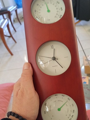 Temperature, clock and humidity meter used in good condition
