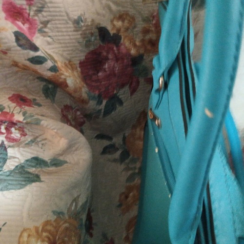Bag with long strap with small signs of wear