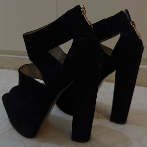 Black platforms size 36 mint condition with gold zipper