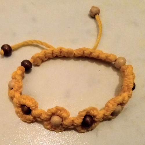 Handmade bracelet like new with yellow wooden beads