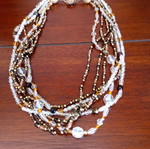 Necklace new with multiple strands