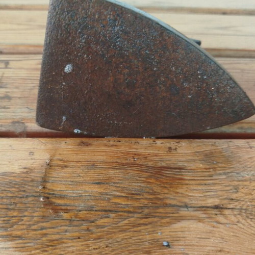 Old cast iron clothes iron used