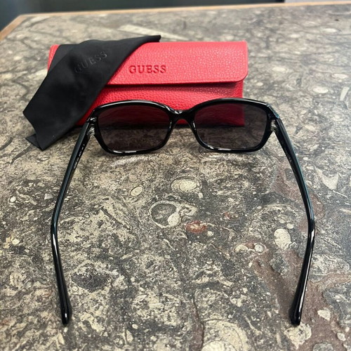 Guess women's sunglasses with red protective case and black cloth