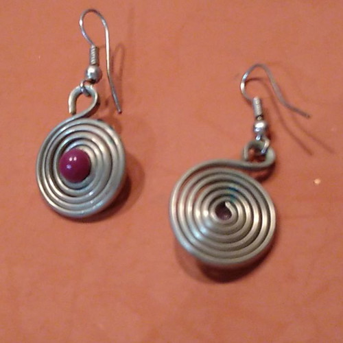 Earrings with purple beads