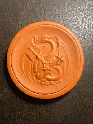Terracotta decorative plate with embossed dragon design new