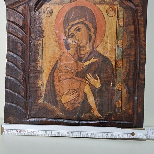 Panagia I Glykofilousa icon on wood used with carved decoration