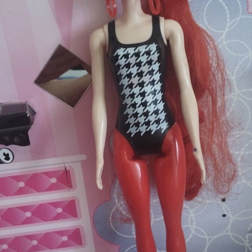Barbie Colour Reveal doll with red dress
