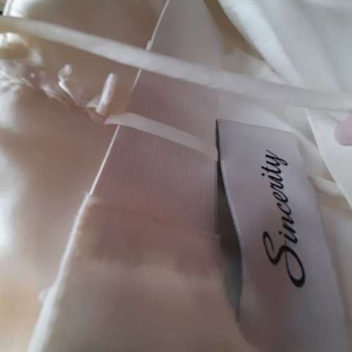 Wedding dress ivory used, strapless with thin extra straps, size small