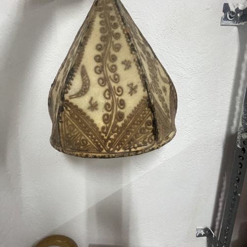 Leather wall sconces like new with Moroccan designs for exotic atmosphere