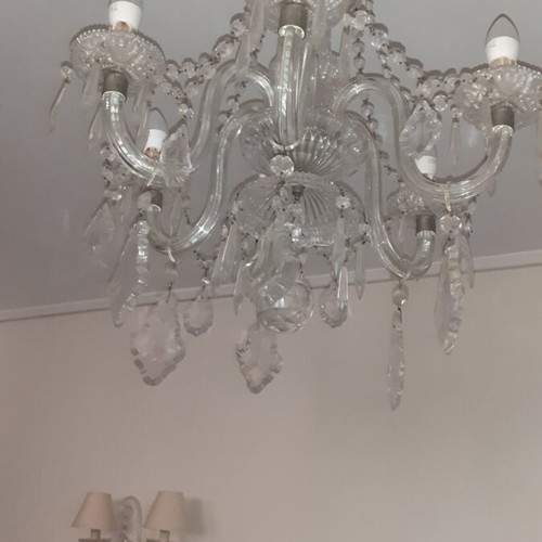 Vintage lighting set with heavy crystal seven-light chandelier and two matching two-light sconces