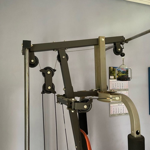 Alpine G41 fitness machine used with 3 handles and adjustable weights