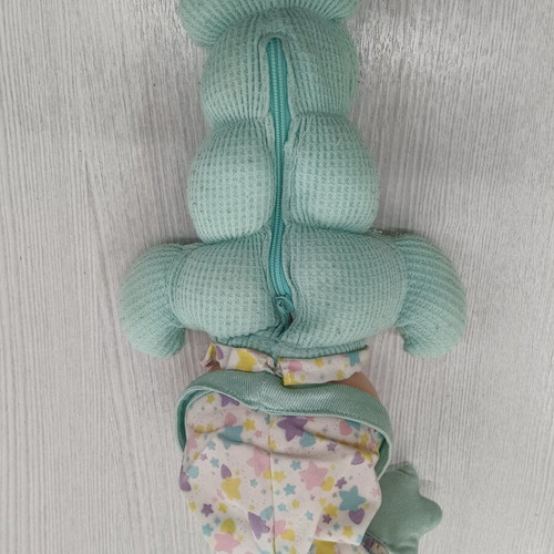 Light-up Huggy toy from the 1990s, fabric stains