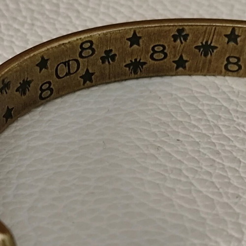 Christian Dior brass cuff bracelet like new, gold tone