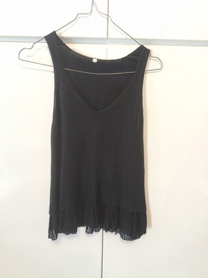 Knitted black top used with sheer hem
