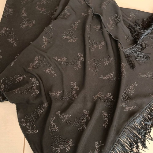 Evening scarf like new, black with embossed designs and fringes