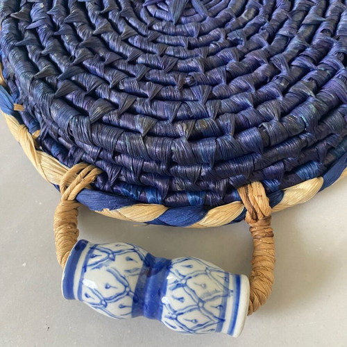 Blue handmade wicker basket with painted porcelain handles like new