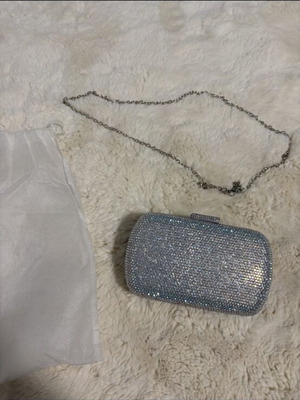 Clutch bag like new, silver