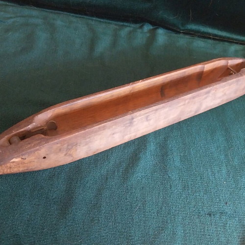 Large wooden loom shuttle used with metal tips