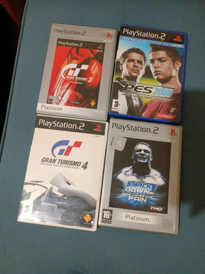 PlayStation 2 games like new Gran Turismo 4, Smack Down, PES 2008, Gran Turismo 3