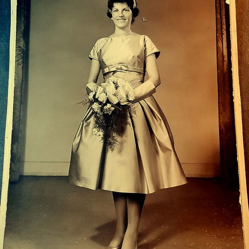 Authentic vintage studio photograph on thick cardboard, used, 1960s fashion
