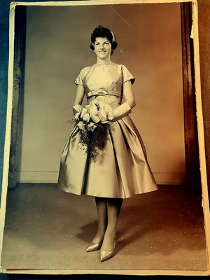 Authentic vintage studio photograph on thick cardboard, used, 1960s fashion