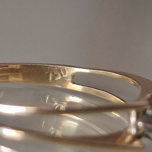 Gold ring with diamond. Solitaire.