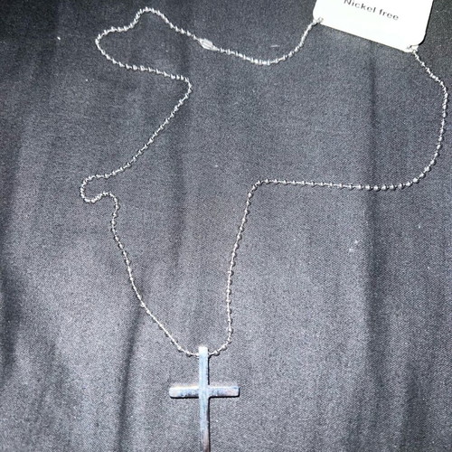 Steel cross new, silver color, does not tarnish