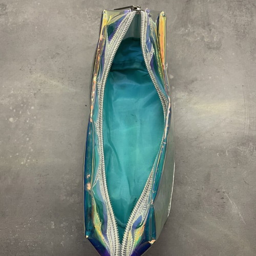 Nuxe holographic makeup bag with silver base
