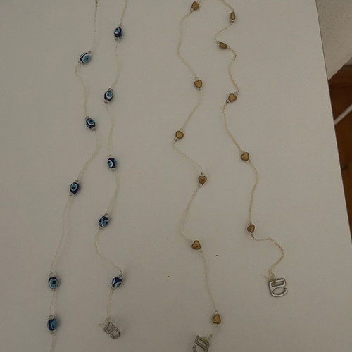 Bra straps new with eye designs and golden hearts