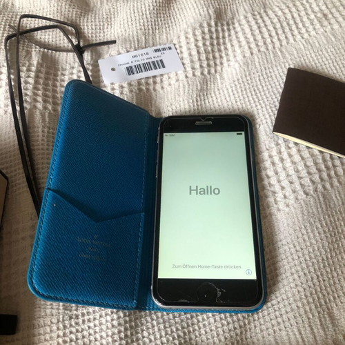 Iphone 6 used unlocked with authentic Louis Vuitton leather case, cable and silicone cover