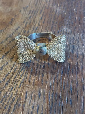 Bow Adjustable Ring used in Gold Tone