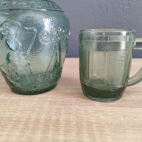 Vintage glass carafe with wine glass used