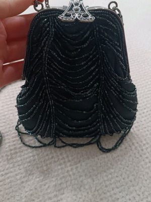 Evening bag like new, black with long chain