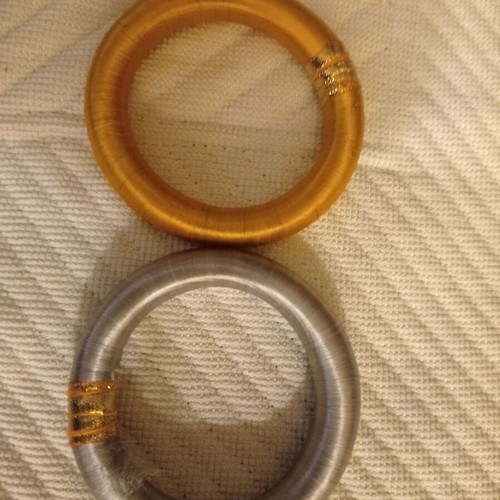 Set of 2 bracelets used, 6.5cm inner width