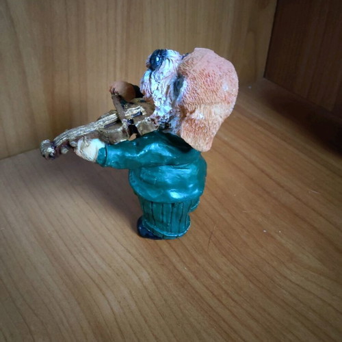 Decorative dog figure with violin like new