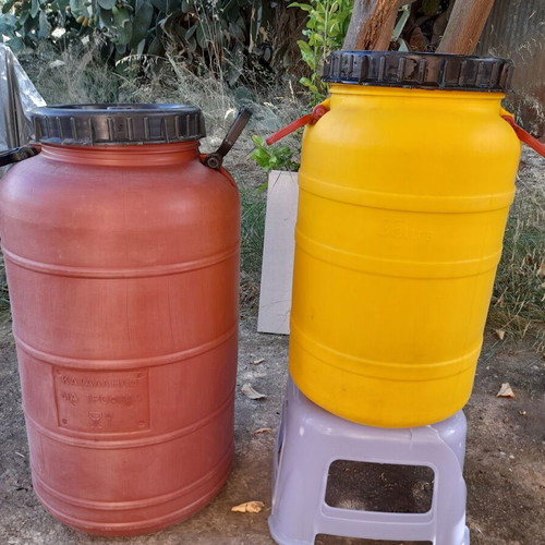 Plastic barrels for food storage, 35L yellow and 60L orange
