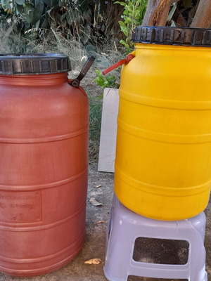 Plastic barrels for food storage, 35L yellow and 60L orange