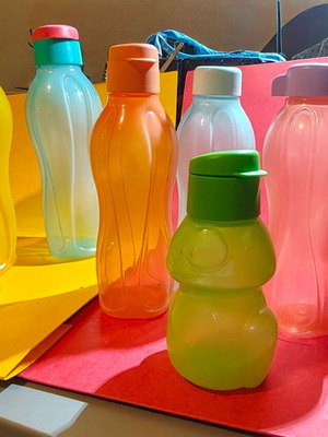 Tupperware bottles new, set of 10 with various sizes