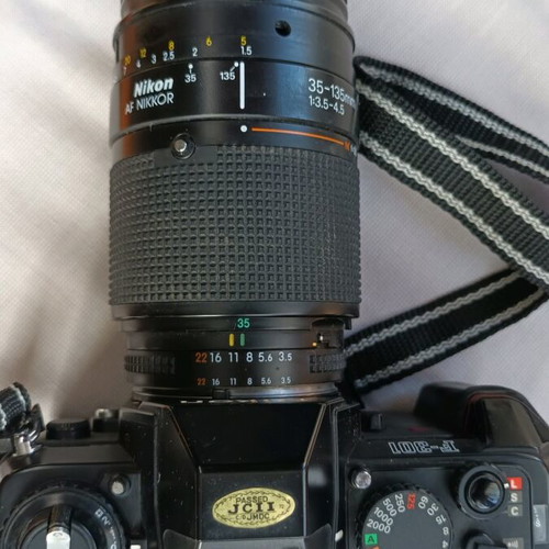 Nikon F301 camera used with 35-135 lens and flash