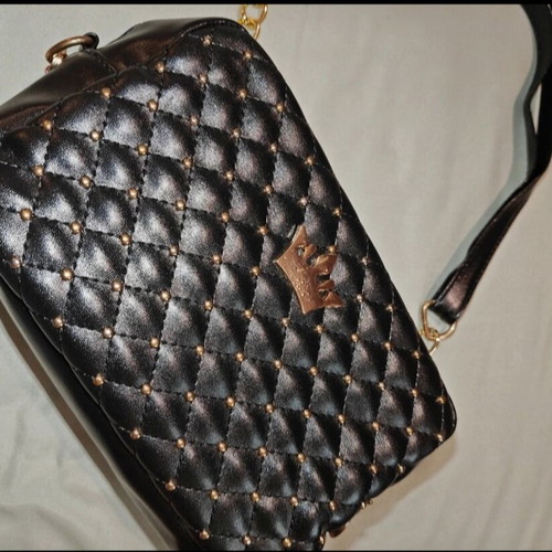 Women's crossbody bag like new, black with gold details