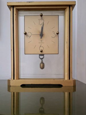 Vintage quartz table clock with pendulum used