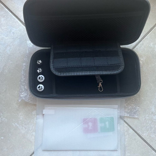 Nintendo Switch OLED case and screen protector new